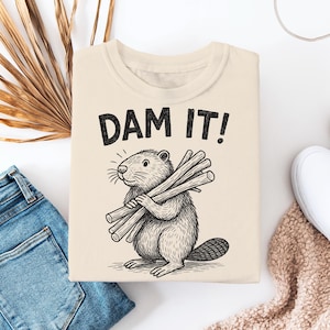 Funny &quot;Dam It!&quot; beaver shirt, cute hand-drawn beaver carrying logs! Perfect sarcastic gift for animal lovers and pun fans.