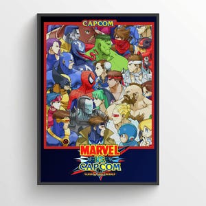 May include: A framed poster featuring a colorful collage of Marvel and Capcom characters. The top displays the text CAPCOM, while the bottom features the logo MARVEL VS. CAPCOM CLASH OF SUPER HEROES. The artwork includes figures like Spider-Man, Hulk, and Ryu.