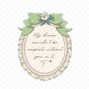 Puede incluir: Un marco decorativo ovalado con un lazo verde claro y detalles florales. El marco tiene un borde con volantes y contiene el texto escrito a mano: "My dream wouldn't be complete without you in it."