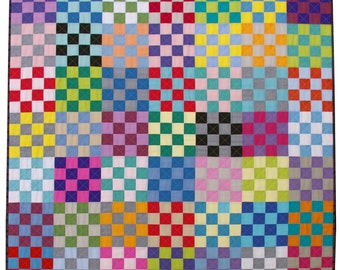 May include: A colorful quilt with a checkered pattern in various shades of red, blue, green, yellow, pink, purple, and black.