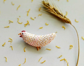 Un poulet. Bird.Pin.