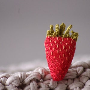 The strawberry pin