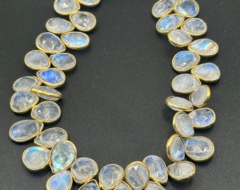 Rainbow moonstone facetted pear 8x12mm bezel