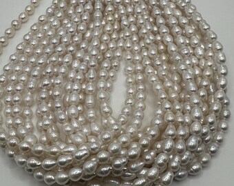 Fresh water pear tear drop shape top to bottom drill.