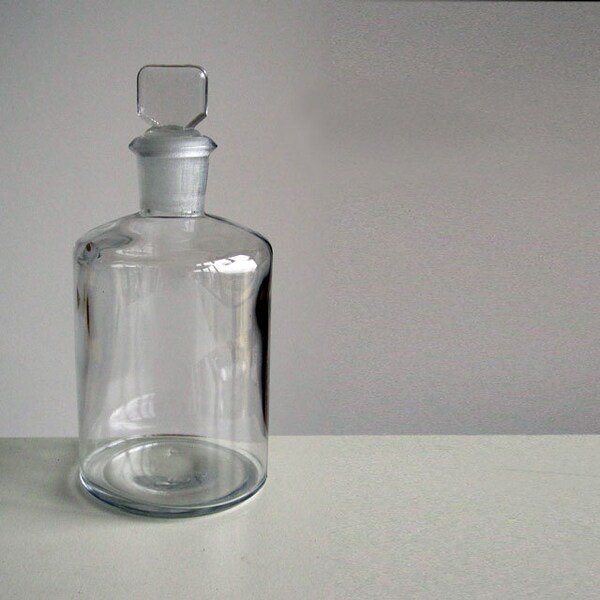 Glass apothecary bottle with stopper / chemist's jar display