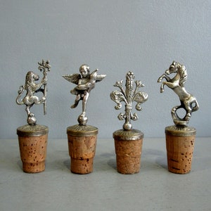 Vintage Montagnini bottle stoppers, set of four