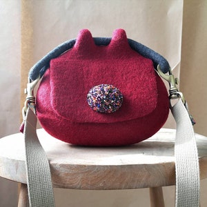 Red felted pouch cross body bag. Bespoke felted mini bag. Designer wool felt bag. Sustainable felt fashion. Handcrafted in UK image 1