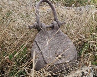 Bespoke design felted wool handbag. Sustainable design, unique hand felted bag in natural beige colour. Retro shape felt bag by Onstail. UK