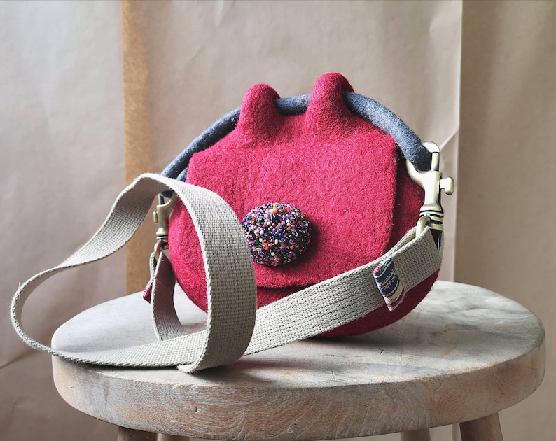 Red felted pouch cross body bag. Bespoke felted mini bag. Designer wool felt bag. Sustainable felt fashion. Handcrafted in UK image 3