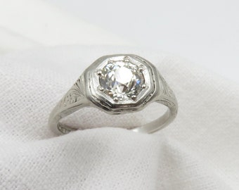 Circa 1920's Platinum Engagement Ring set with 0.83 CT VS1 Old European Cut Diamond