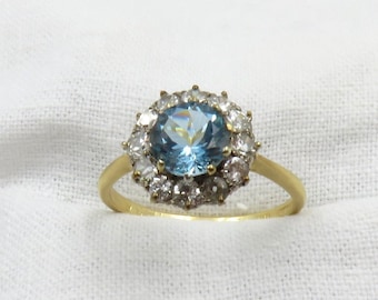 Circa 1950's  1.00 carat  Brilliant Cut  Aquamarine and Diamond Ring Set in Platinum and 18karat Gold