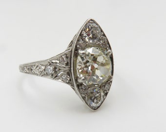 Circa 1915 Edwardian platinum and diamond ring set with GIA cert. 1.52 carat Old Mine Cut Diamond