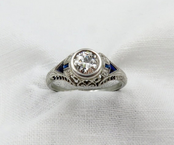 Art Deco Diamond and Platinum Engagement Ring centered with a 0.62 ct Old European cut diamond