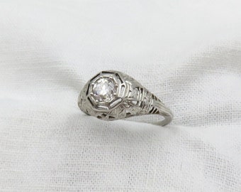 On Sale. Circa 1930 .58 Carat VS2, Color H, Old European cut Diamond Engagement Ring set in 18kt White Gold