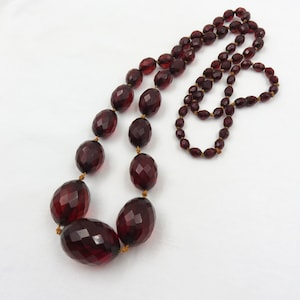 Circa 1930.  Faceted Bakelite Bead Necklace, Cherry Bakelite