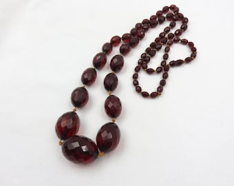 Circa 1930.  Faceted Bakelite Bead Necklace, Cherry Bakelite
