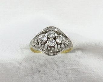 Circa 1910 18KT Gold and Platinum ring set with Old European Cut Diamonds