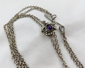 Circa 1890.  Victorian Silver and Amethyst Watch Chain/Slide Chain