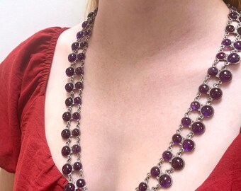 Circa 1940. Double Strand Bezel Set Cabochon Amethyst Necklace