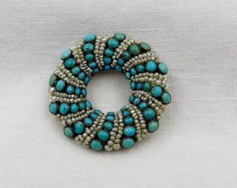 Circa 1870. Austro Hungarian Seed Pearl and Persian Turquoise Brooch