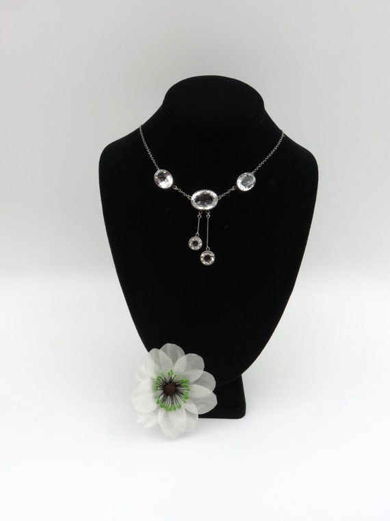Circa 1930.  Faceted Crystal and Sterling Silver N