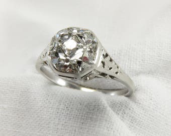 Circa 1915 Edwardian Platinum Engagement Ring with French Cut Diamonds, VS2 Clarity.