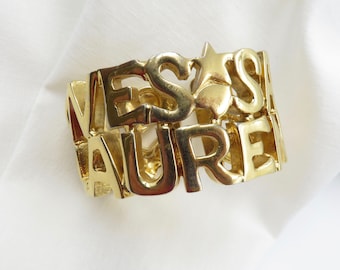 Circa 1980's Yves Saint Laurent Logo Cuff