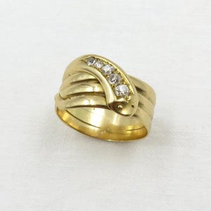C. 1900 18kt gold snake ring set with mine cut diamonds