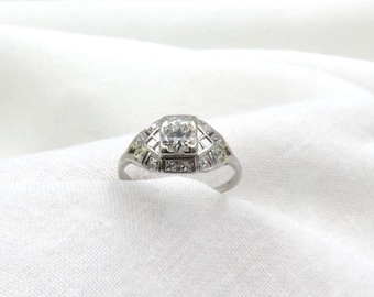 Circa 1950 Platinum Ring Featuring 0.52 ctw Round Brilliant Cut Diamond