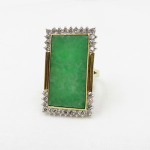 Circa 1960. 14kt Yellow Gold Natural Jadeite Jade and Diamond Ring