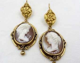Circa 1870. 14kt Gold and Carved Shell Cameo Dangle Earrings