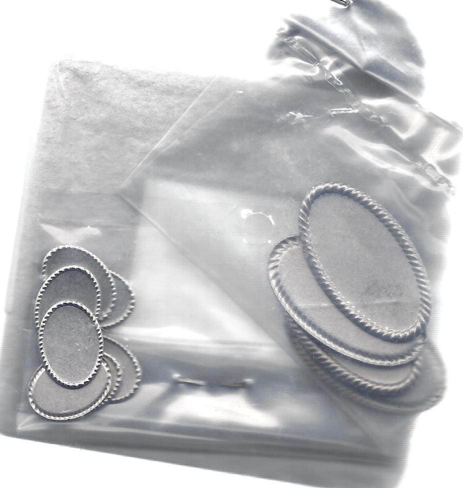Metal Scrapbook Embellishments. Frame roughly 2.6x2.8" for picture 1x1.3". 6 Ovals .75x1.25", 7