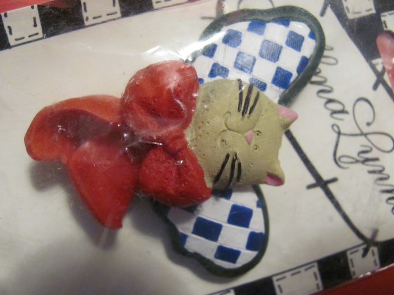 Beige Cat Face with Red Angle Dress and Bow Checkered Red and Black Wings about 2.25 Two VIntage 1997 Alma Lynne Cat Angel Ornaments