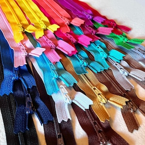 Zippers in bulk - twenty assorted 7 inch YKK  zippers - bright, light, and neutral zippers, all purpose zippers with closed end