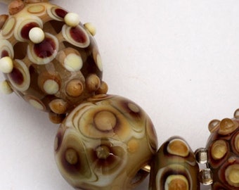 Lampwork glass beads in series - The Chicken or the Egg