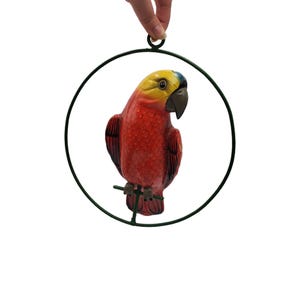 Vintage Hand Painted Mexican Tropical Red Yellow Black Ceramic Parrot Bird Statue Figurine Folk Art Perched on Hanging Hoop