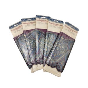 May include: Five rolls of "Sculptured Borders by Warner" wallpaper border. Each roll features a repeating paisley design in shades of blue, burgundy, and cream. The packaging is a dark blue with white text.