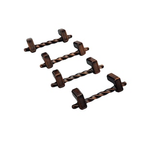 May include: Set of five bronze-colored cabinet pulls. Each pull features a rectangular end piece and a twisted, bar-shaped handle. The pulls are designed for easy installation and add a touch of elegance to any cabinet or drawer.