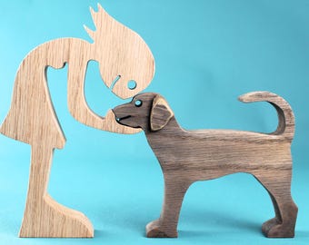 Figura de niña y perro de madera artesanal: Arte con sierra de calar