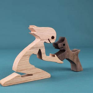 Handcrafted Wooden Sculpture of Girl with Dog Companion