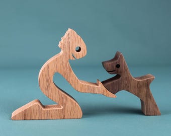 Handcrafted Wooden Man and Dog Sculpture: Minimalist Pet Lover Art