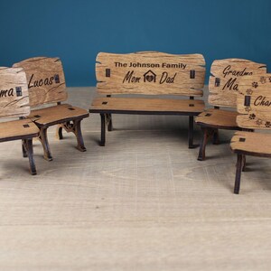 May include: A set of wooden chairs and a bench with personalized names. The bench has the text "The Johnson Family Mom Dad" and the chairs have the names "Emma", "Lucas", "Grandma Ma", and "Charley" with paw prints.