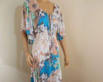 floral rayon dress, ruffle sleeves and hem, cinched waist, small, Luxelle