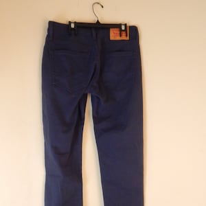 Levis 511, navy blue. 31/32, stretch