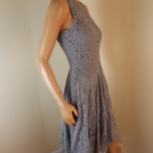 gray lace dress with hankerchief hem.  small with slip