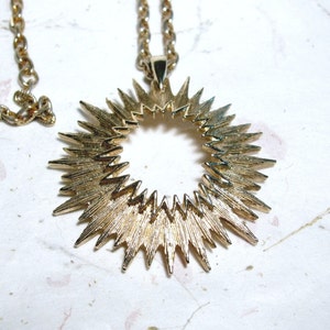 Vintage Sarah Coventry Gold Tone Outer Space Sunburst Pendant image 1