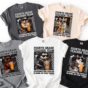 May include: Five short-sleeved t-shirts in charcoal, cream, gray, white, and black. Each features a graphic of an animal wearing sunglasses and holding an iced coffee, with the text "FOURTH GRADE TEACHER TEAM" and "CAFFEINATED CHAOS IS KIND OF OUR THING."
