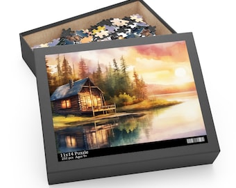 May include: A 252 piece jigsaw puzzle featuring a cabin in the woods by a lake at sunset. The box is open and shows the completed puzzle image. The box has the text "11x14 Puzzle 252 pcs Ages 9+"