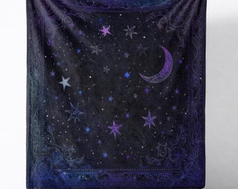May include: A dark blanket featuring a celestial design with a night sky theme. The blanket has a black background with scattered stars in blue and white, a crescent moon, and star shapes in purple. The border has an ornate, swirling pattern.
