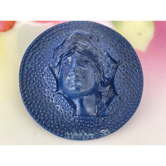 Antique 1920s Blue Molded Plastic Pop out Lady Lib